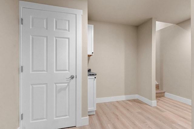 120 Eleonor St, Two Rivers, WI 54241 - spare room with light wood-style flooring and baseboards