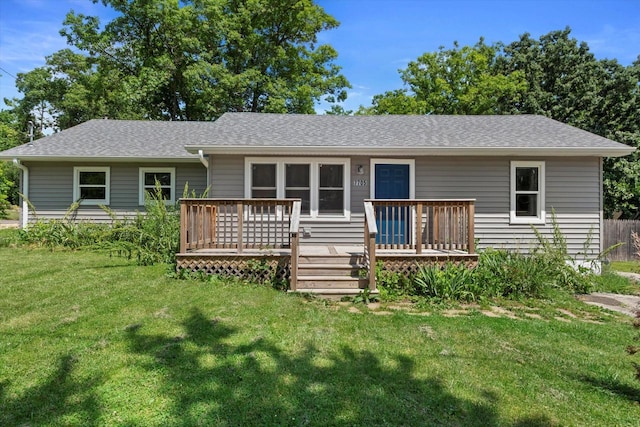 7705 241st Ave, Salem, WI 53168 - back of property with a wooden deck, a yard, and a shingled roof
