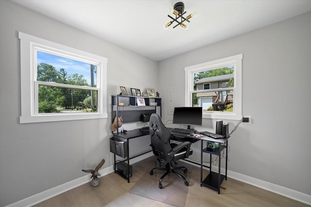 7705 241st Ave, Salem, WI 53168 - office with wood finished floors and a chandelier