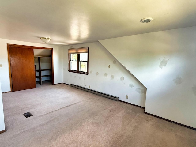 6352 W Medford Ave, Milwaukee, WI 53218 - additional living space featuring baseboard heating and carpet