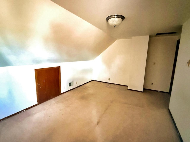 6352 W Medford Ave, Milwaukee, WI 53218 - additional living space featuring vaulted ceiling and carpet flooring