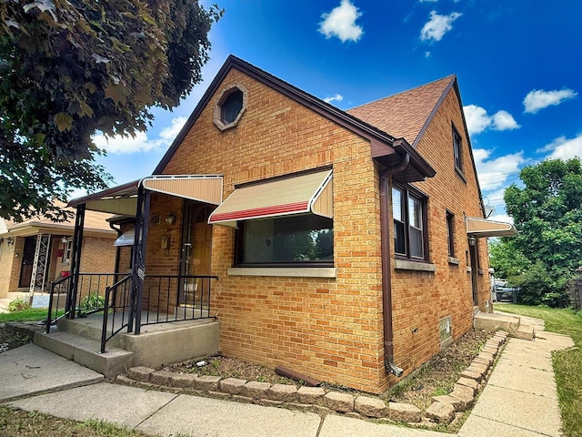 6352 W Medford Ave, Milwaukee, WI 53218 - view of front of house with brick siding and roof with shingles