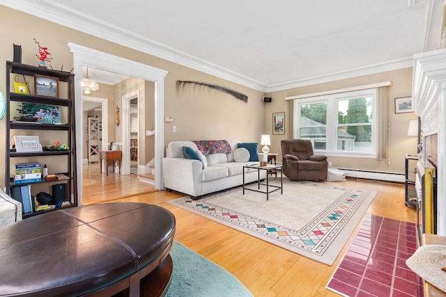 814 E Irving Ave, Oshkosh, WI 54901 - living area with baseboard heating, hardwood / wood-style floors, and crown molding