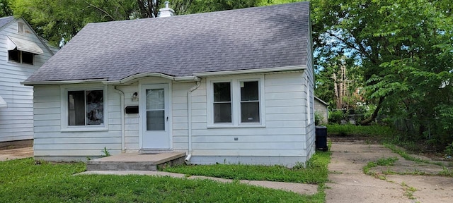 4652 N 49th St, Milwaukee, WI 53218 - bungalow-style home with roof with shingles and a chimney