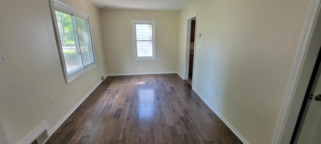 4652 N 49th St, Milwaukee, WI 53218 - spare room featuring plenty of natural light and dark wood-type flooring