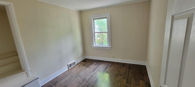 4652 N 49th St, Milwaukee, WI 53218 - unfurnished room featuring dark wood-type flooring and baseboards