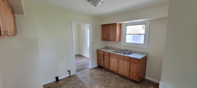4652 N 49th St, Milwaukee, WI 53218 - kitchen with brown cabinetry and light countertops