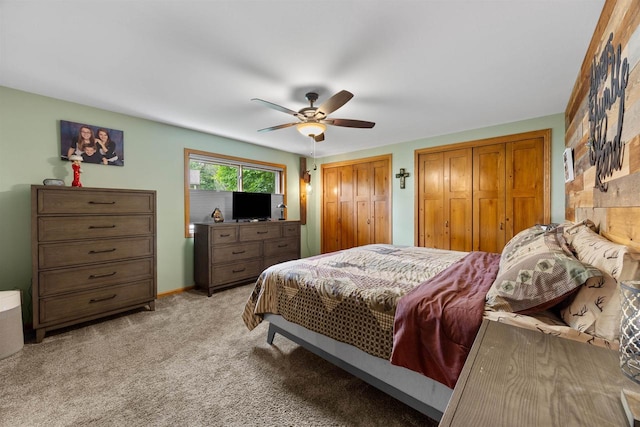 361 Penhurst Way, Nekoosa, WI 54457 - bedroom with multiple closets, light carpet, and ceiling fan