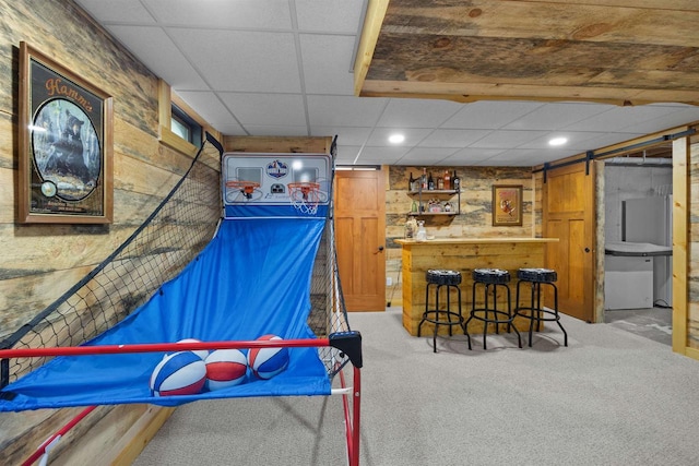 361 Penhurst Way, Nekoosa, WI 54457 - game room with a drop ceiling, carpet floors, a dry bar, recessed lighting, and wooden walls