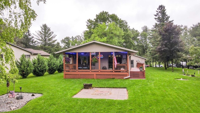 361 Penhurst Way, Nekoosa, WI 54457 - back of house with a patio area, a lawn, and a wooden deck