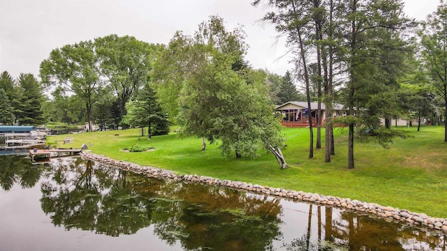 361 Penhurst Way, Nekoosa, WI 54457 - view of community featuring a water view, a yard, and a boat dock