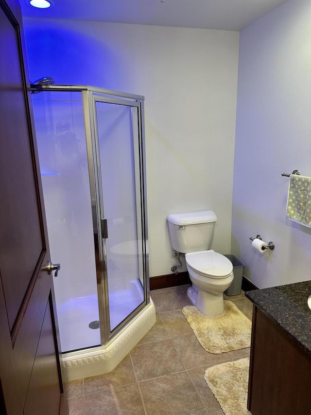 333 W Mifflin St Unit 1156, Madison, WI 53703 - bathroom with vanity, tile patterned flooring, and a stall shower
