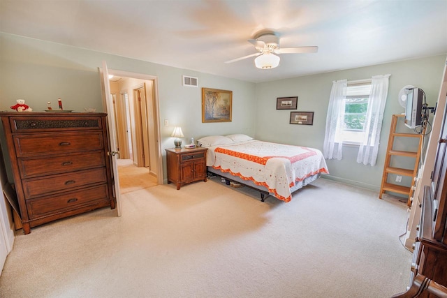 2278 S Riverside Dr, Beloit, WI 53511 - bedroom featuring light colored carpet and ceiling fan