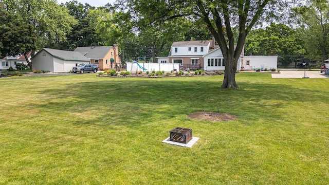 2278 S Riverside Dr, Beloit, WI 53511 - view of yard featuring view of scattered trees and a fire pit