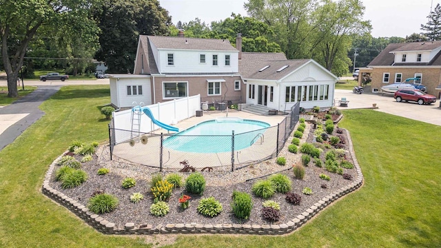 2278 S Riverside Dr, Beloit, WI 53511 - view of pool featuring a water slide and entry steps
