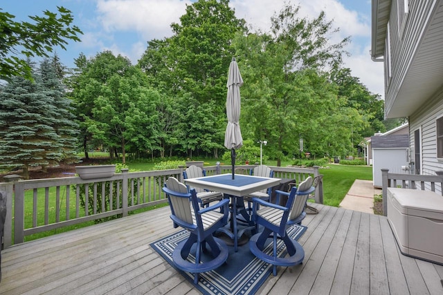 847 Chisholm Ln, Port Washington, WI 53074 - deck with outdoor dining area and a lawn