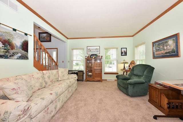 847 Chisholm Ln, Port Washington, WI 53074 - living room featuring ornamental molding, light colored carpet, plenty of natural light, and stairway