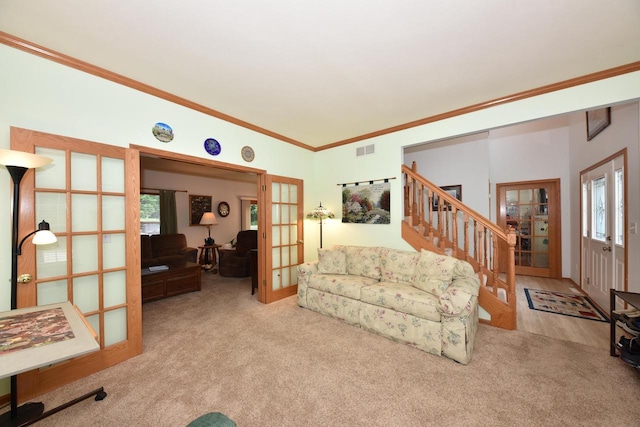 847 Chisholm Ln, Port Washington, WI 53074 - living room with french doors, ornamental molding, stairs, and carpet flooring