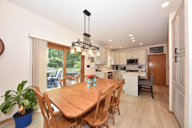 847 Chisholm Ln, Port Washington, WI 53074 - dining room featuring light wood finished floors and recessed lighting