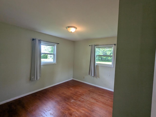 N51W14111 Lancaster Ave, Menomonee Falls, WI 53051 - spare room with wood finished floors