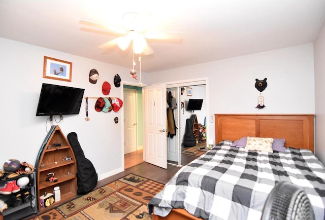 6401 237th Ave, Salem, WI 53168 - bedroom featuring a closet, wood finished floors, and ceiling fan