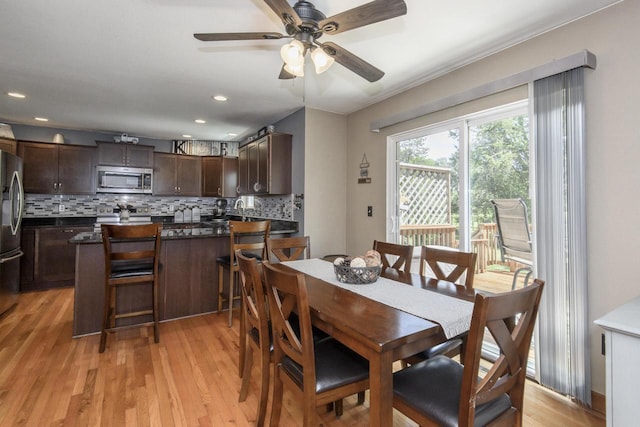 2335 Macarthur Rd, Waukesha, WI 53188 - dining space featuring light wood finished floors, ceiling fan, and recessed lighting