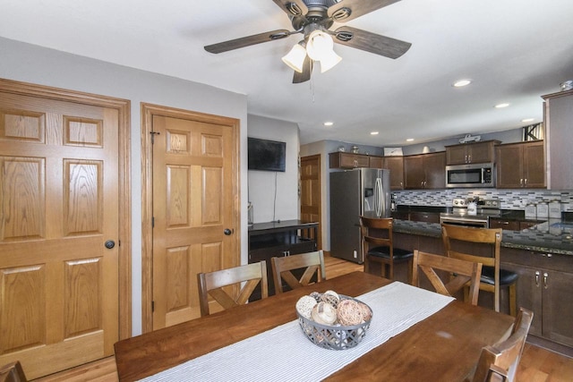 2335 Macarthur Rd, Waukesha, WI 53188 - dining room featuring ceiling fan and light wood-style floors