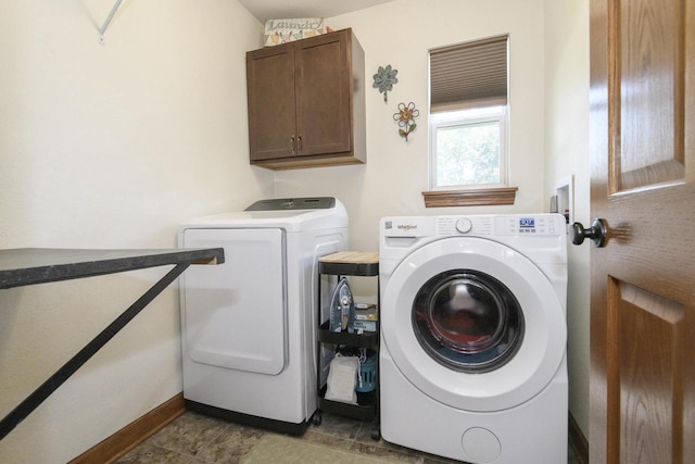 2335 Macarthur Rd, Waukesha, WI 53188 - washroom featuring washer and clothes dryer and cabinet space