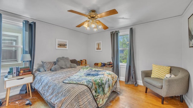 1345 Annie Ct, Sheboygan, WI 53083 - bedroom with wood finished floors and a ceiling fan