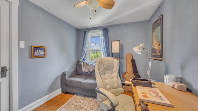1345 Annie Ct, Sheboygan, WI 53083 - living area featuring ornamental molding, a ceiling fan, and wood finished floors