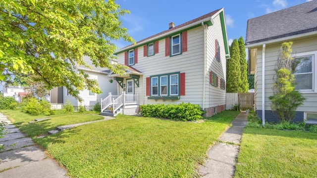 1345 Annie Ct, Sheboygan, WI 53083 - view of front facade with a chimney