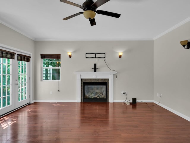 N8986 Swift Lake Dr, East Troy, WI 53120 - unfurnished living room with crown molding, wood finished floors, a fireplace, and ceiling fan