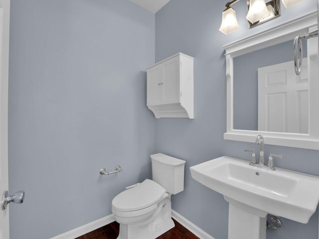 N8986 Swift Lake Dr, East Troy, WI 53120 - bathroom featuring baseboards and wood finished floors