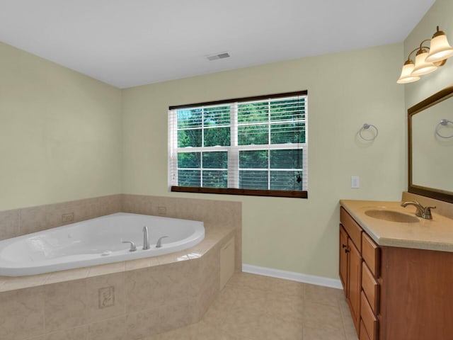 N8986 Swift Lake Dr, East Troy, WI 53120 - bathroom featuring vanity, a garden tub, and tile patterned floors