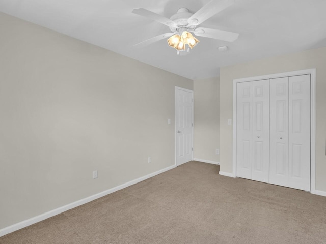 N8986 Swift Lake Dr, East Troy, WI 53120 - unfurnished bedroom with carpet flooring, a closet, and ceiling fan