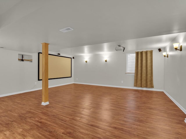 N8986 Swift Lake Dr, East Troy, WI 53120 - cinema room featuring wood finished floors and baseboards