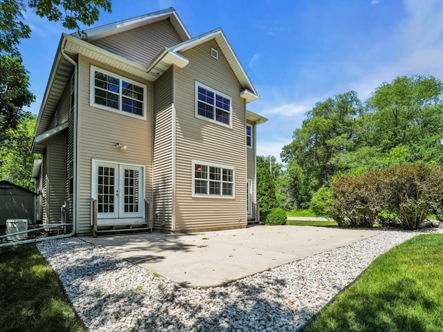 N8986 Swift Lake Dr, East Troy, WI 53120 - back of house with french doors and a patio