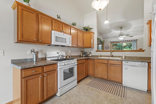 10724 S Christina Ct, Oak Creek, WI 53154 - kitchen featuring white appliances, lofted ceiling, brown cabinets, ceiling fan, and dark countertops