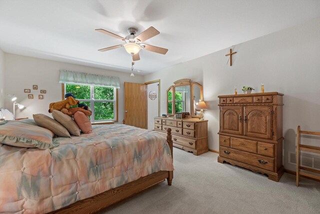 10724 S Christina Ct, Oak Creek, WI 53154 - bedroom with multiple windows, light colored carpet, and a ceiling fan