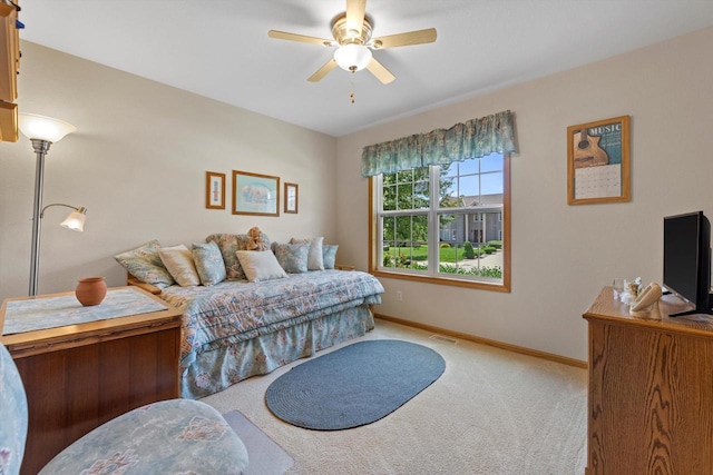 10724 S Christina Ct, Oak Creek, WI 53154 - carpeted bedroom featuring baseboards and a ceiling fan
