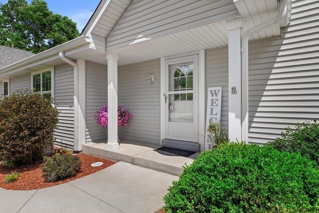 10724 S Christina Ct, Oak Creek, WI 53154 - entrance to property with a porch and a shingled roof