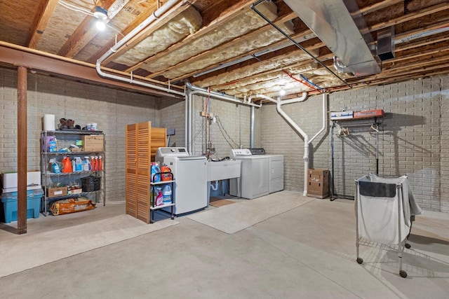 10724 S Christina Ct, Oak Creek, WI 53154 - unfinished basement featuring independent washer and dryer and brick wall