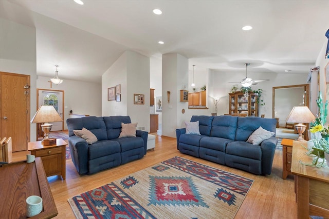 10724 S Christina Ct, Oak Creek, WI 53154 - living room featuring lofted ceiling, a ceiling fan, light wood finished floors, and recessed lighting