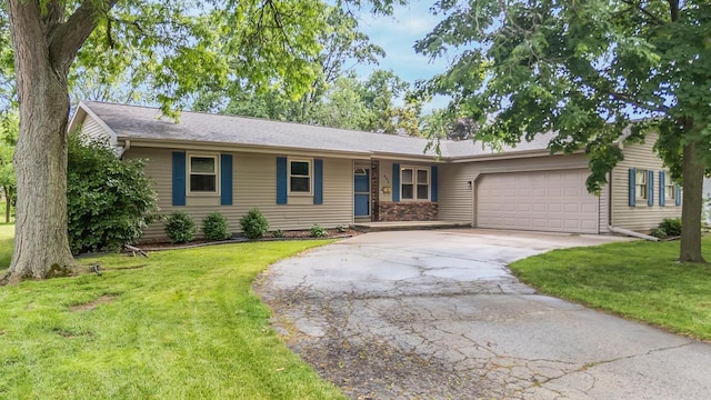 531 E Taft Ave, Appleton, WI 54915 - single story home with a garage, concrete driveway, and a front yard