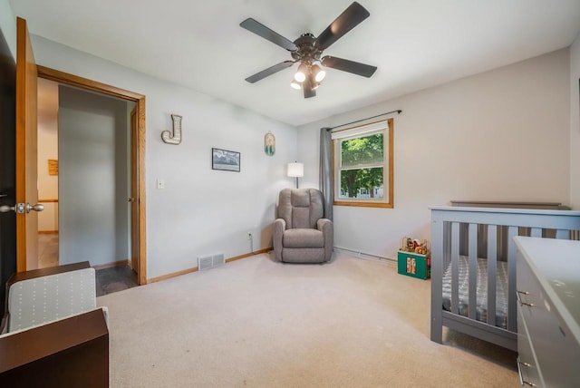 531 E Taft Ave, Appleton, WI 54915 - bedroom with carpet floors, a nursery area, and a ceiling fan
