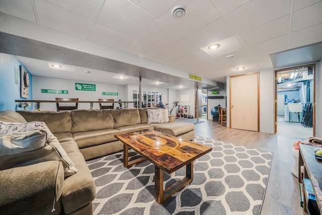 531 E Taft Ave, Appleton, WI 54915 - living area with light wood-style floors and a drop ceiling