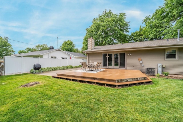 531 E Taft Ave, Appleton, WI 54915 - rear view of property with a wooden deck, a chimney, french doors, and outdoor dining space