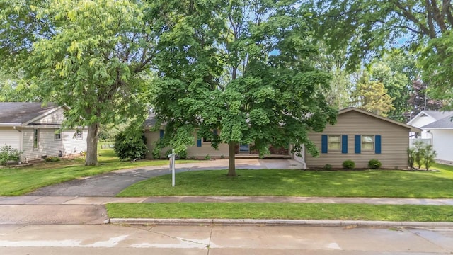 531 E Taft Ave, Appleton, WI 54915 - view of property hidden behind natural elements with a front yard and driveway