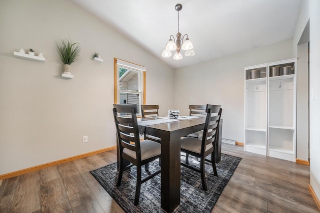 531 E Taft Ave, Appleton, WI 54915 - dining area with wood finished floors, a chandelier, and vaulted ceiling