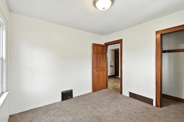 6222 W Locust St Unit 6224, Milwaukee, WI 53210 - unfurnished bedroom featuring carpet flooring and a closet